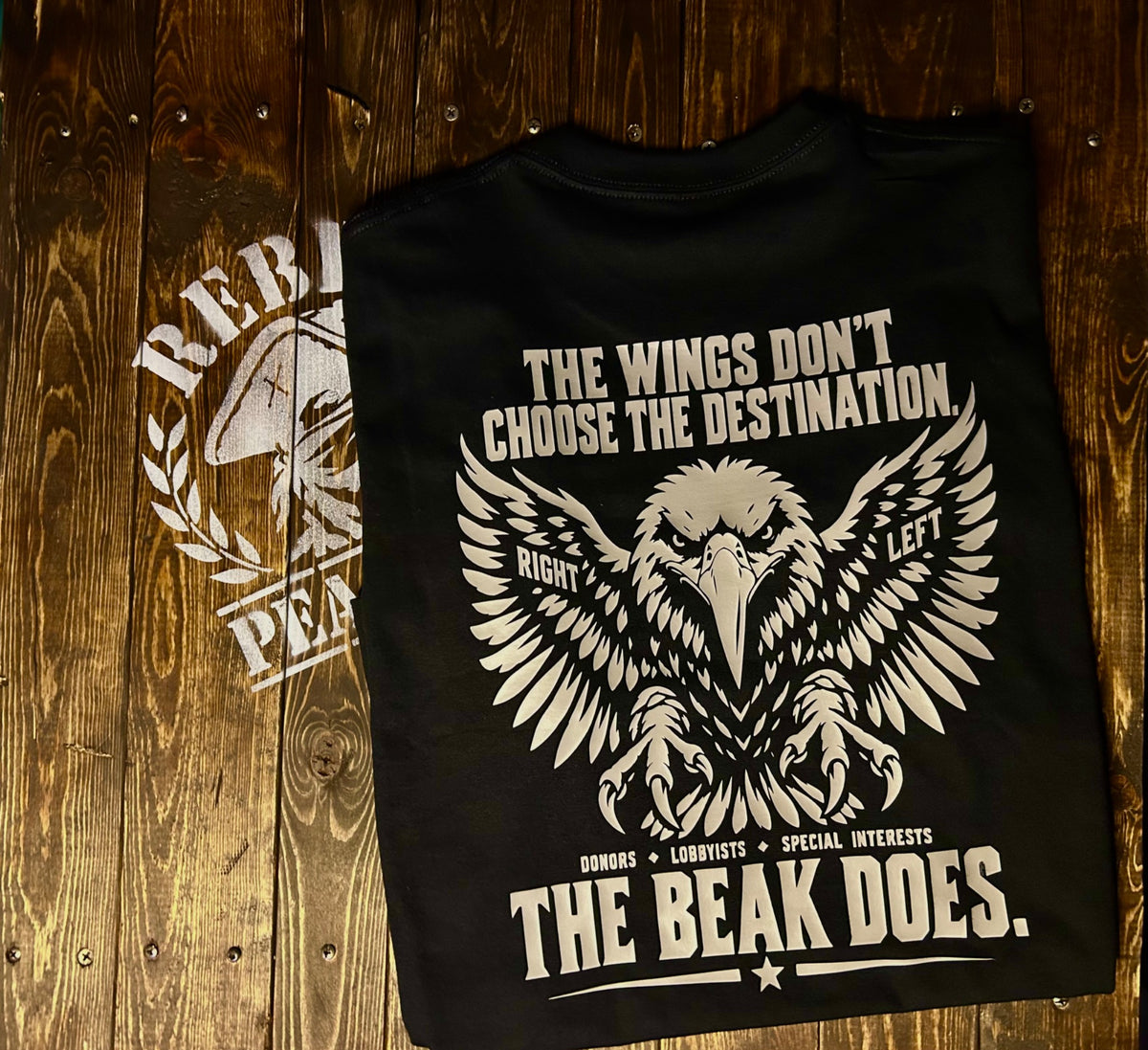 Rebel Peasants The Beak Does shirt back with eagle graphic and political statement
